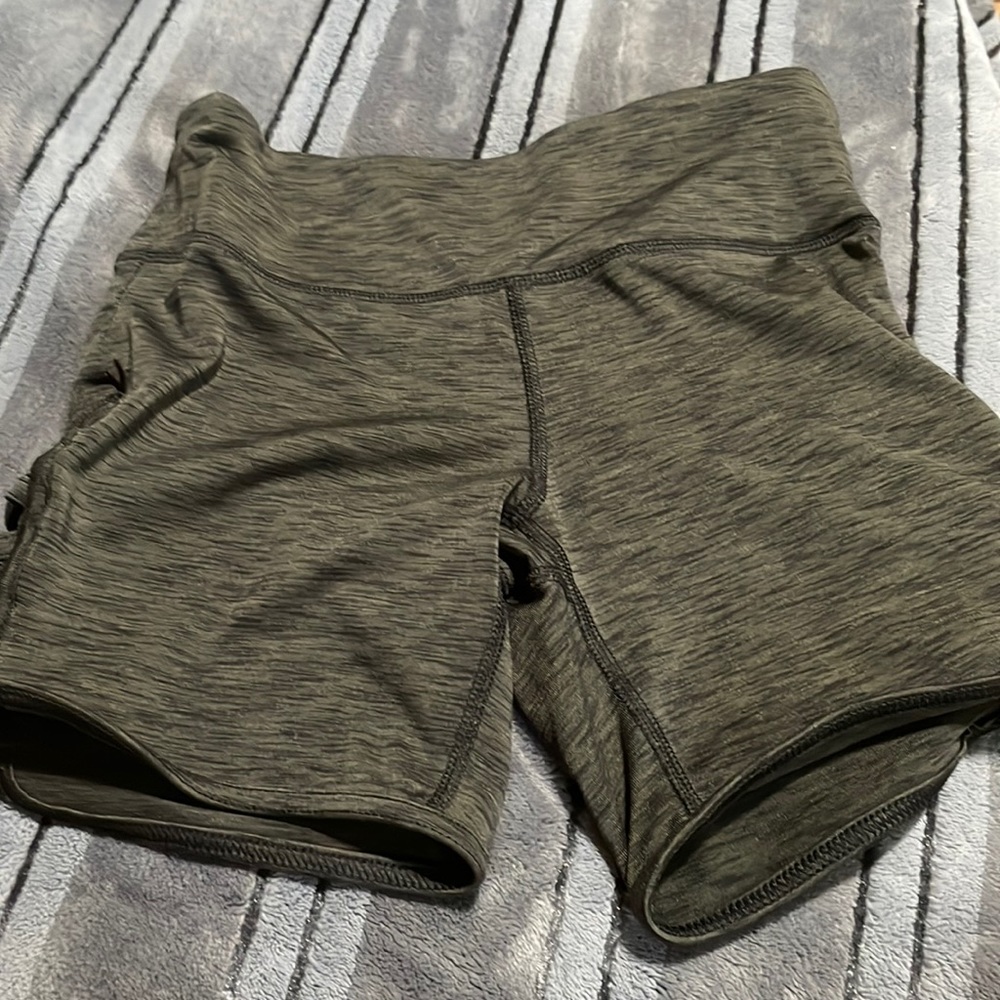 Green biker shorts